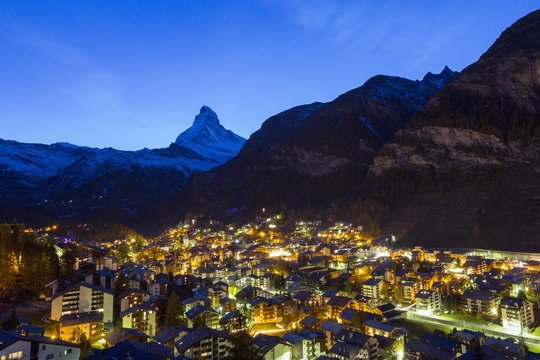 View of Zermat at dusk with Matterhorn in the background. Canton of Valais, Switzerland Europe