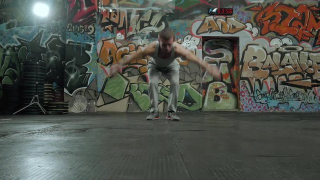 Sport healthy power young man working out,crossfit fitness training, doing acrobatics exercise, acrobat athlete