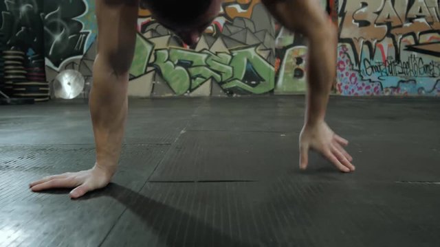 Sport healthy power young man working out,crossfit fitness training, doing acrobatics exercise, acrobat athlete