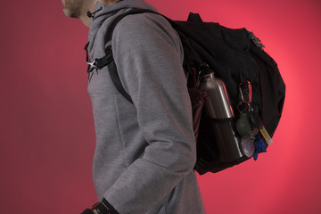 Man with bugout bag backpack