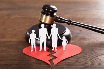 Family Paper Cut On Broken Heart With A Gavel