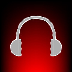 Headphones sign illustration. Postage stamp or old photo style on red-black gradient background.