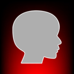 People head sign. Postage stamp or old photo style on red-black gradient background.