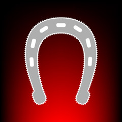 Horseshoe sign illustration. Postage stamp or old photo style on red-black gradient background.