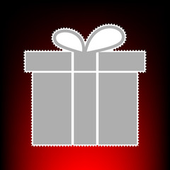 Gift box sign. Postage stamp or old photo style on red-black gradient background.