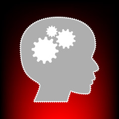 Thinking head sign. Postage stamp or old photo style on red-black gradient background.