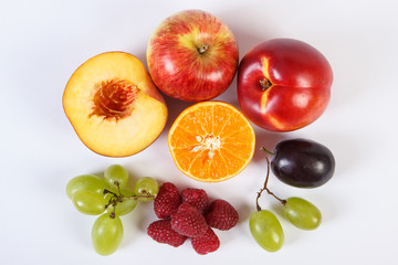 Fresh ripe fruits on white background