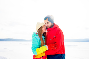 Happy couple outdoors in winter