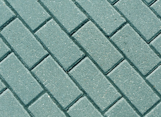 Cyan color cobblestone pavement close-up