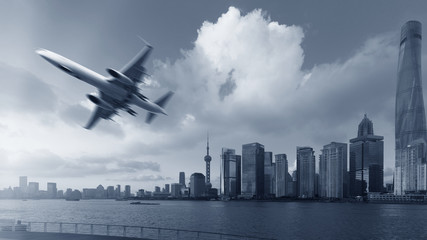 Naklejka premium Shanghai's city skyline and aircraft