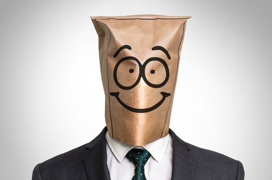 Businessman with a bag on the head - with smile face