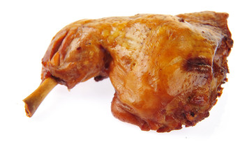 On a white background of the chicken leg