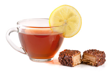 chocolate candy with a cup of tea isolated on white background