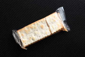 Biscuit in the sealed plastic packaging represent the confectionary concept related idea.