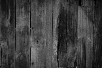 Black wood textured background.