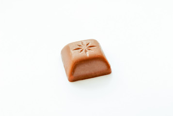 Chocolate pieces on a white background