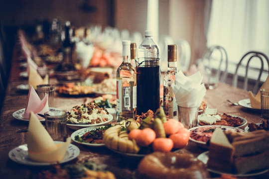 Table served with food and drink