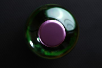 Liquor bottle green color represent the liquor business and alcohol concept related idea.