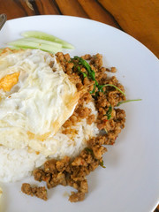 Rice topped with stir-fried pork