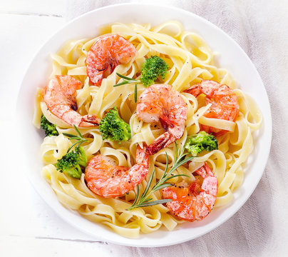 Pasta with shrimps. Healthy diet eating concept.