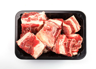 pieces of meat on a white background