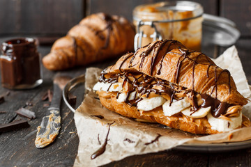 Croissant with banana, peanut butter and chocolate