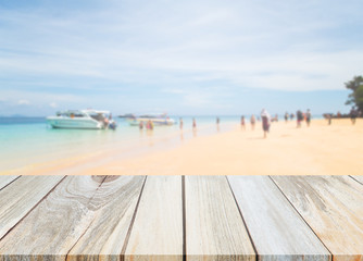 Fototapeta premium Wood Table Top And Blur Background Of The Beach.