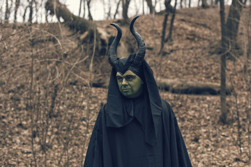 the green witch in the autumn forest