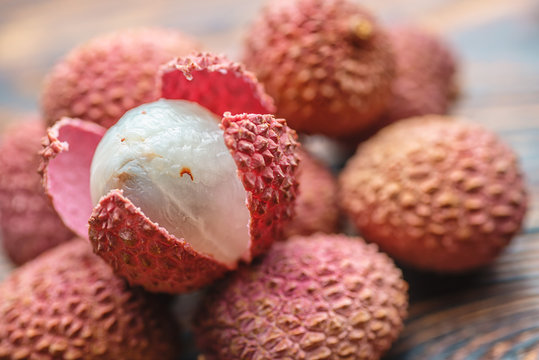 Lichee on wooden table, litchi, lychee fruit detail