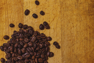 the coffee beans on old table