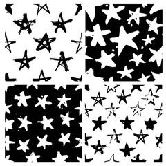 Set of hand drawn paint seamless pattern. Black and white stars background