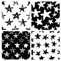 Set of hand drawn paint seamless pattern. Black and white stars background