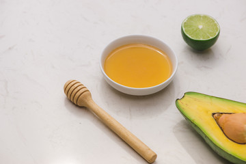 Healthy food concept. Fresh organic avocado on table