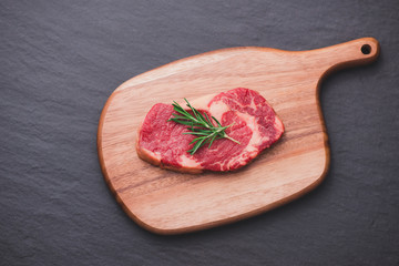 Raw beef meat on a cutting board