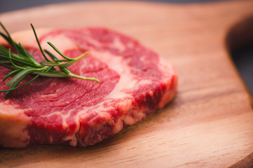 Raw beef meat on a cutting board