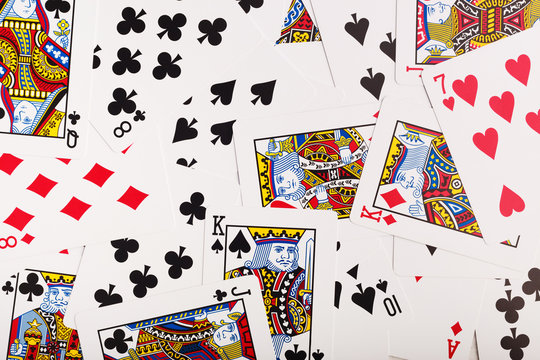 Pile of poker card texture. Casino cards as background.