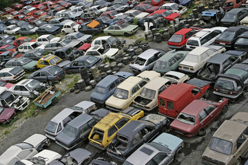 Scrap Car Recycle Yard with lots of old crushed cars