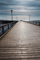 Fototapeta premium Footbridge in Baltic sea, Palanga, Lithuania.