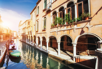 Gondolas on canal in Venice. Venice is a popular tourist destination of Europe.