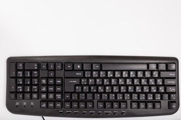 Black keyboard with a mouse on a white background. Isolate