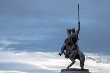 Bratislava, Slovakia - March 19, 2017: King Svatopluk Statue At Bratislava Castle with a dark blue sky background 
