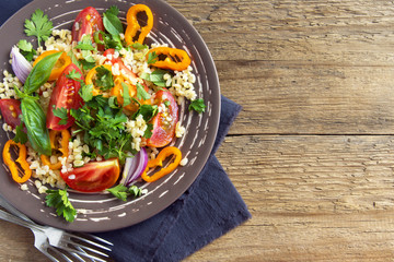 Tomato and couscous salad