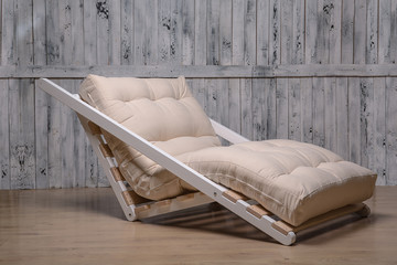 outdoor furniture is a comfortable folding sofa.