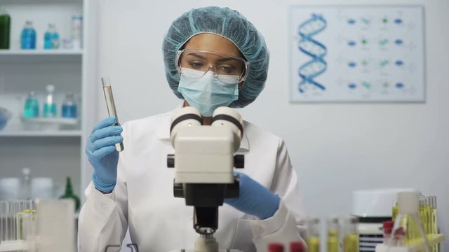 Laboratory assistant doing biochemical analysis of blood, bacteriological test