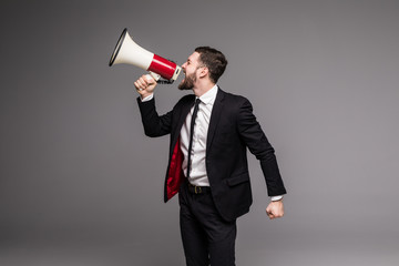 side view Business man screaming with a megaphone