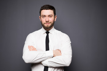 Portrait of handsome happy young businessman