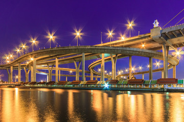 Fototapeta na wymiar Twilight cityscape of Bhumibol Bridge across Chao Phraya River, Bangkok, Thailand