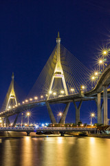 Night cityscape of Bhumibol Bridge across Chao Phraya River, Bangkok, Thailand