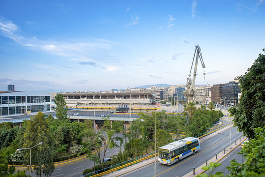 Part view of the port of Piraeus with the cruise terminal and the peripheral road under a blue sky .Greece