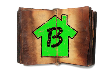 Diagnostic de performance énergétique B sur livre ancien en parchemin, maison verte